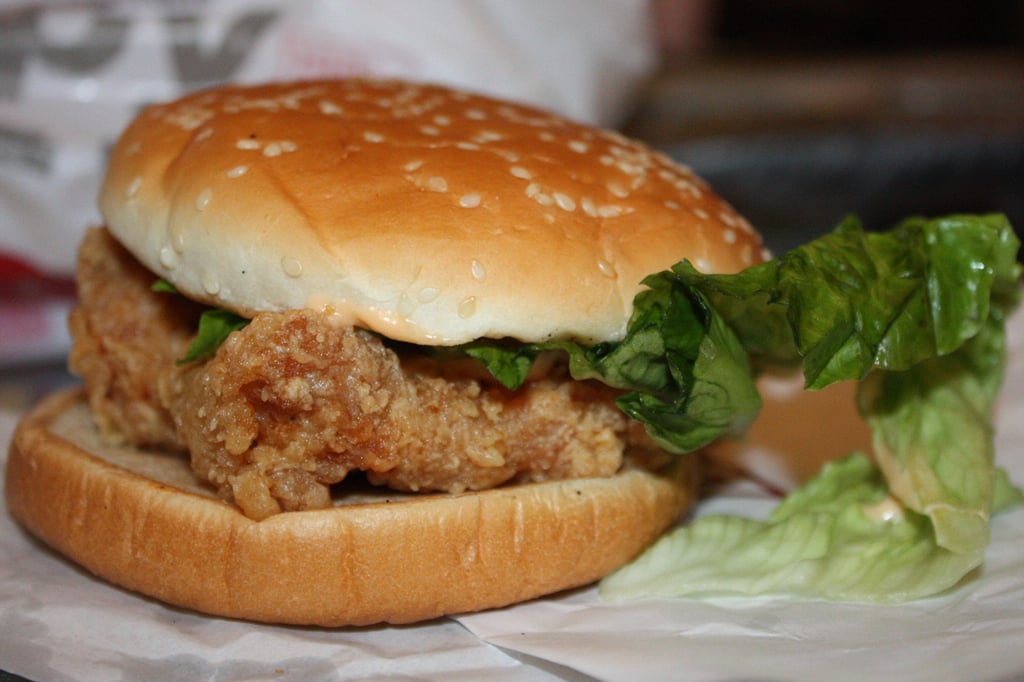 A KFC burger. The fast food giant has notified its Australian customers that it will be using a blend of lettuce and cabbage in its burgers. Photo: David Sutton A KFC burger. The fast food giant has notified its Australian customers that it will be using a blend of lettuce and cabbage in its burgers. Photo: David Sutton