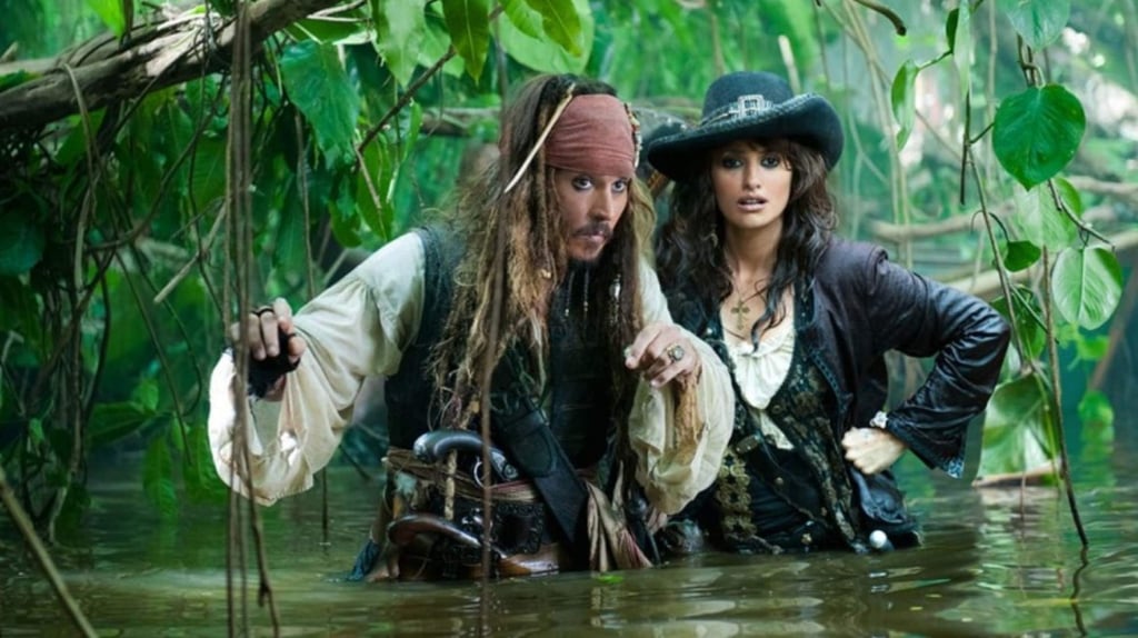 Johnny Depp with Penélope Cruz in Pirates of the Caribbean: On Stranger Tides. Photo: Walt Disney Studios/Motion Pictures Johnny Depp with Penélope Cruz in Pirates of the Caribbean: On Stranger Tides. Photo: Walt Disney Studios/Motion Pictures