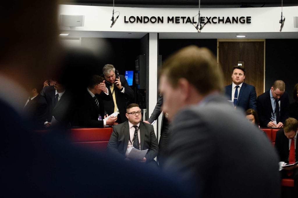Traders operate in the open outcry ring at the London Metal Exchange. Photo: AFP