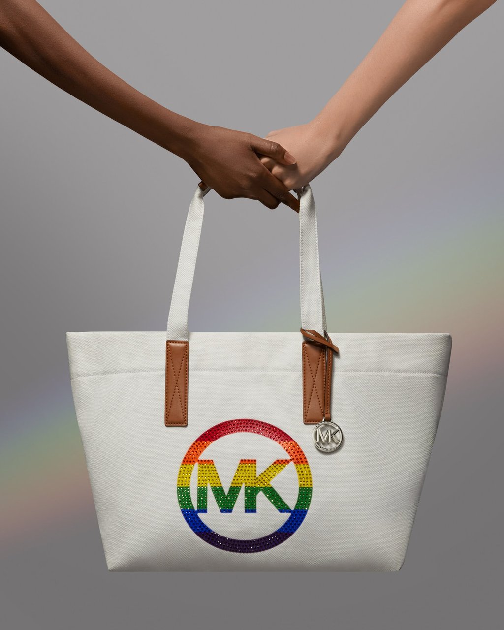 Michael Kors will be donating profits from the sale of its tote bag to OutRight Action International. Michael Kors will be donating profits from the sale of its tote bag to OutRight Action International.