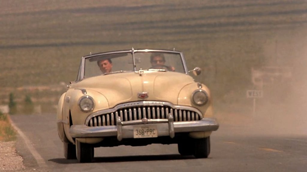 Tom Cruise (right) in the 1949 Buick Roadmaster he drove alongside Dustin Hoffman in Rain Man. Photo: MGM/UA Communications Co. Tom Cruise (right) in the 1949 Buick Roadmaster he drove alongside Dustin Hoffman in Rain Man. Photo: MGM/UA Communications Co.