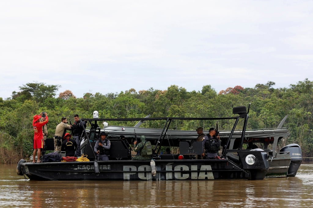 Police officers and rescue team members during the search for British journalist Dom Phillips and indigenous expert Bruno Pereira. Photo: Reuters Police officers and rescue team members during the search for British journalist Dom Phillips and indigenous expert Bruno Pereira. Photo: Reuters