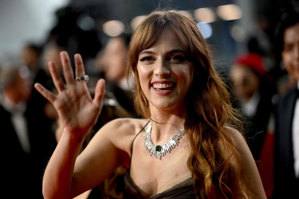 US director and actress Riley Keough waves as she arrives for the screening of her film War Pony at the 75th edition of the Cannes Film Festival in Cannes, southern France, on May 21. Photo: AFP US director and actress Riley Keough waves as she arrives for the screening of her film War Pony at the 75th edition of the Cannes Film Festival in Cannes, southern France, on May 21. Photo: AFP