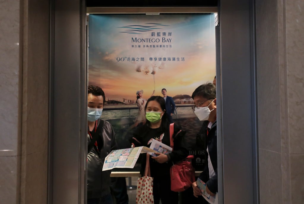 Potential home buyers line up at Minmetal Land’s sales office for the Montego Bay residential project in November 2020. Photo: Xiaomei Chen