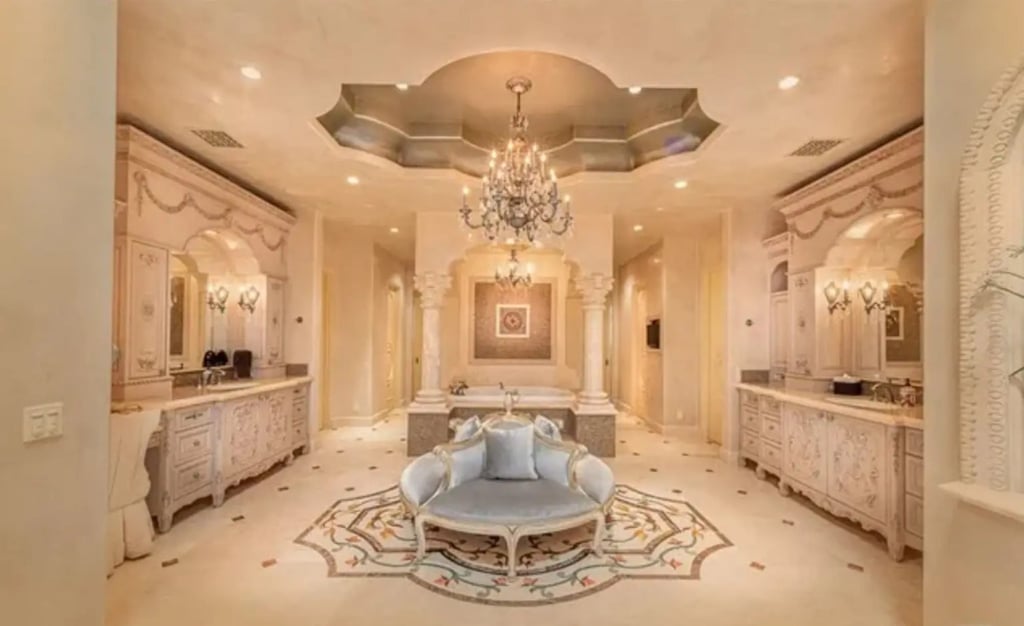 The mansion’s bathrooms feature double vanities while the spa has his-and-hers dressing areas. Photo: Douglas Elliman