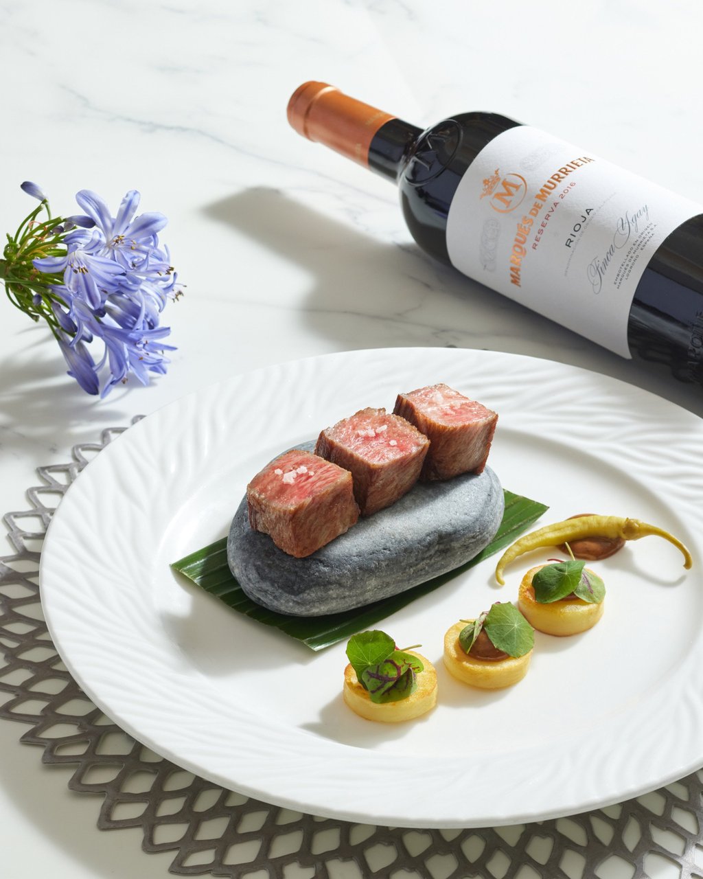 Japanese Wagyu Experience at Felix – chargrilled rib-eye of Hida Wagyu with black garlic, fondant potatoes, and pipparas. Photo: The Peninsula Japanese Wagyu Experience at Felix – chargrilled rib-eye of Hida Wagyu with black garlic, fondant potatoes, and pipparas. Photo: The Peninsula