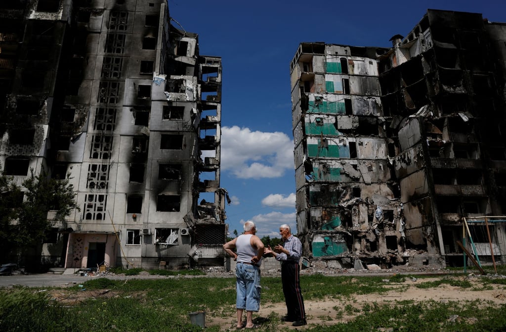 Residents chat in front of a destroyed building in Borodianka, Ukraine, on June 4. Beijing has pulled no punches in blaming the US for Russia’s invasion of the country. Photo: Reuters Residents chat in front of a destroyed building in Borodianka, Ukraine, on June 4. Beijing has pulled no punches in blaming the US for Russia’s invasion of the country. Photo: Reuters