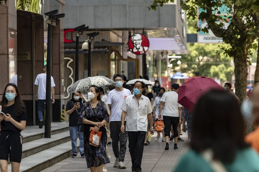 Shoppers on a pedestrian street in Shanghai, China on Saturday. Photo: Bloomberg