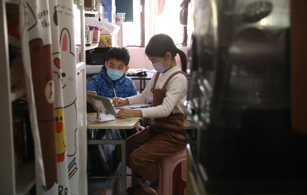 Children from a low-income family taking online classes at home amid the coronavirus pandemic. Photo: K. Y. Cheng