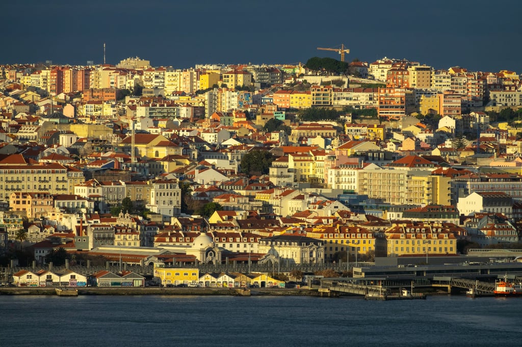 Lisbon’s old city centre at sunset. Photo: Getty Images