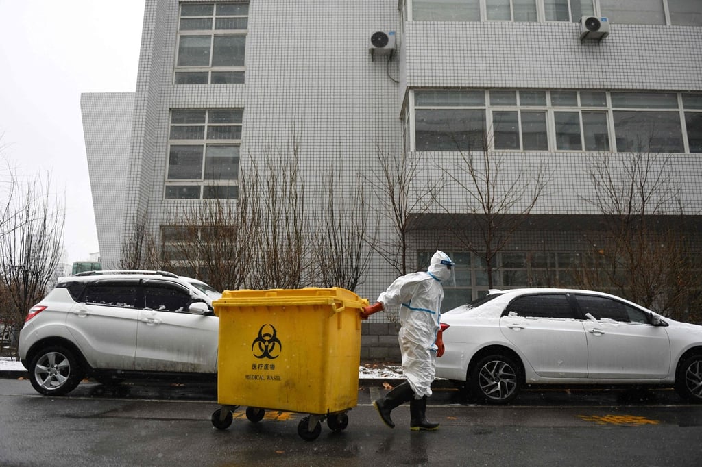 Mass testing is leaving bins bursting with medical waste. Photo: AFP