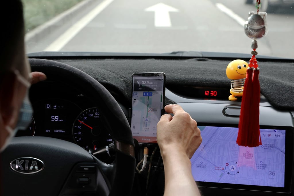 A Didi driver follows navigation directions from Didi’s app in Beijing on July 5, 2021, around the time the company’s apps were removed from app stores in China. Photo: Reuters