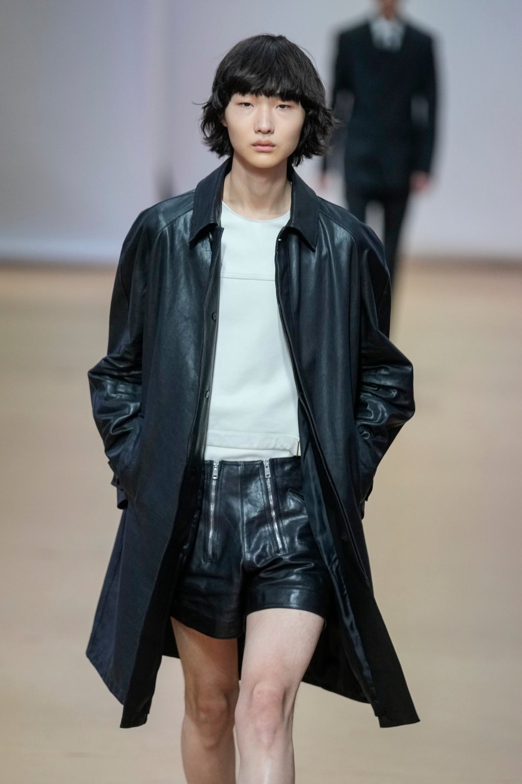 Leather in summer? A model wears a creation as part of the Prada men’s spring/summer 2023 collection presented in Milan, Italy, on June 19. Photo: AP Photo