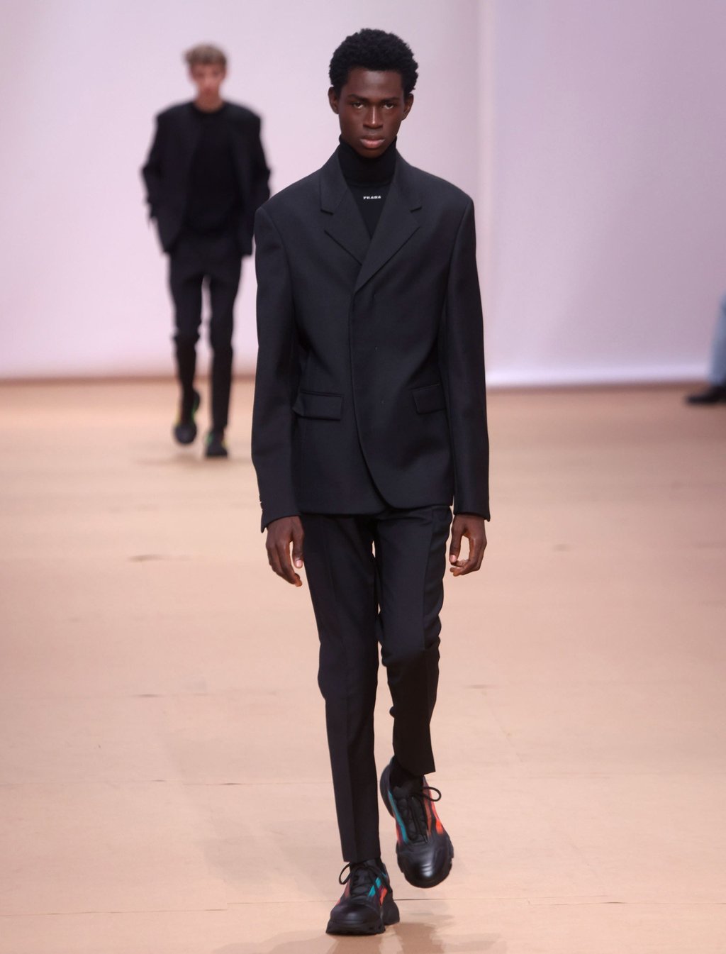 Skinny trousers and pops of colour featured in Prada’s spring/summer 2023 menswear collection presented during Milan Men’s Fashion Week, in Milan, Italy, 19 June 2022. Photo: EPA-EFE