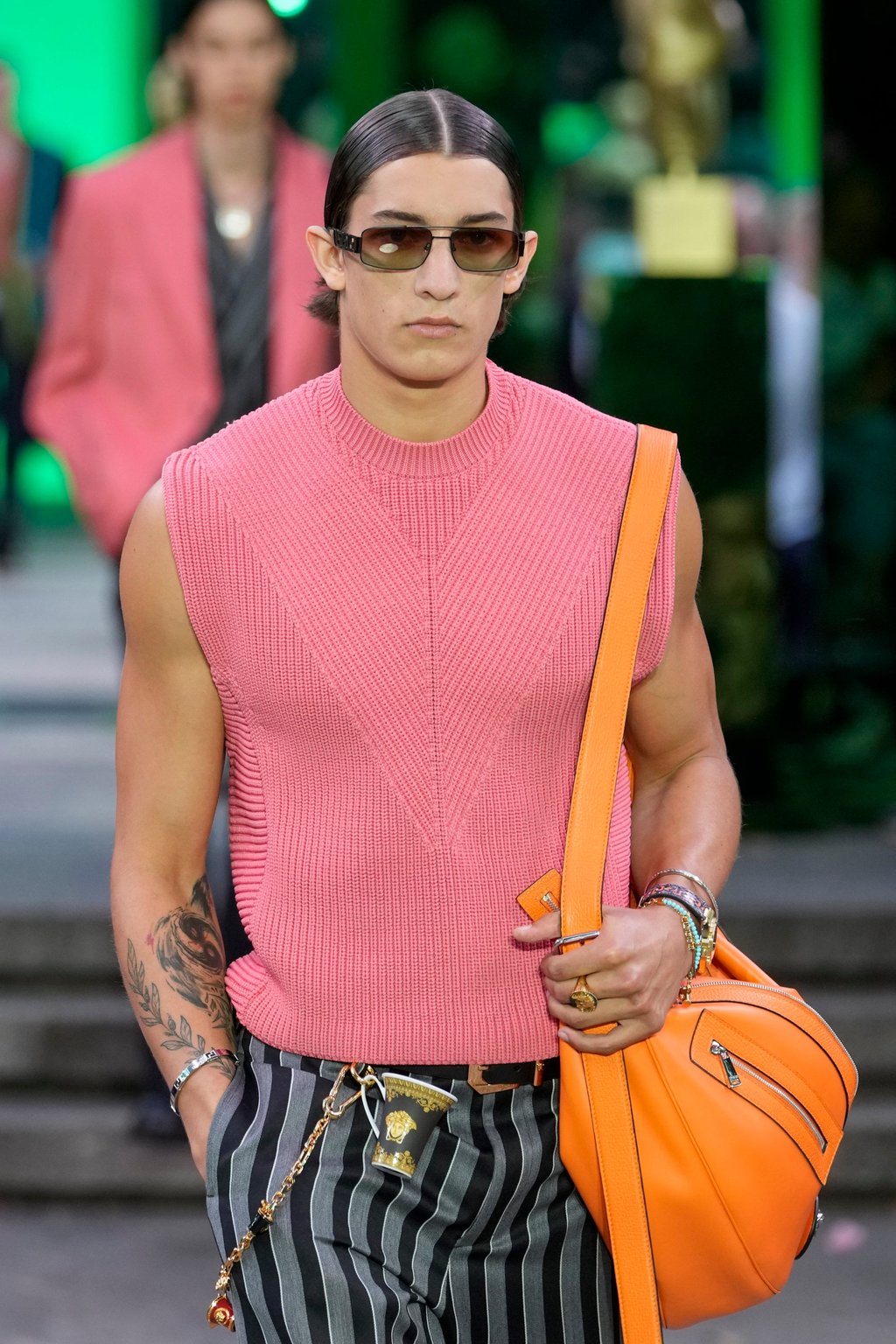 Donatella Versace went for fun and bold colours in the Versace men’s spring/summer 2023 collection presented in Milan, Italy, on June 18. Photo: AP Donatella Versace went for fun and bold colours in the Versace men’s spring/summer 2023 collection presented in Milan, Italy, on June 18. Photo: AP