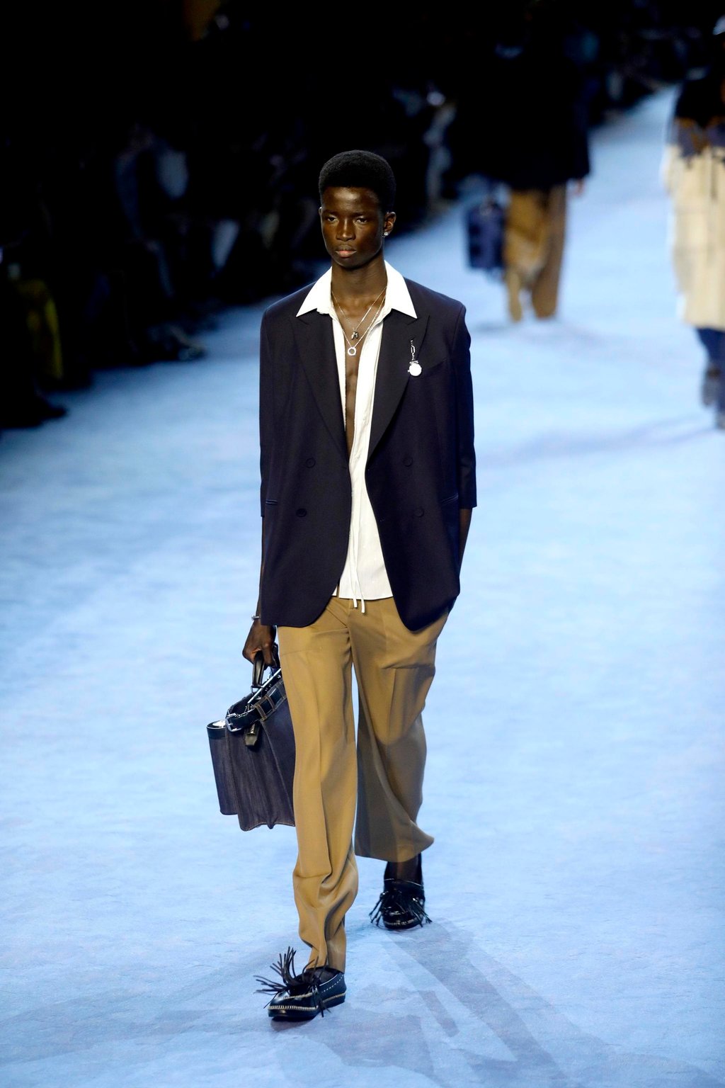 Milan Men s Fashion Week Fendi presented denim fringe and rubber sliders for its spring summer 2023 collection with an earthy colour palette in abundance South China Morning Post