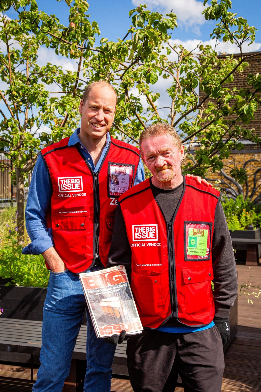 Britain’s Prince William works as a vendor of The Big Issue newspaper on a street. Photo: Reuters