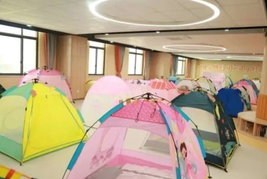 The students are responsible for setting up the tents and creating their own rules for inside their space during nap time. Photo: Inews