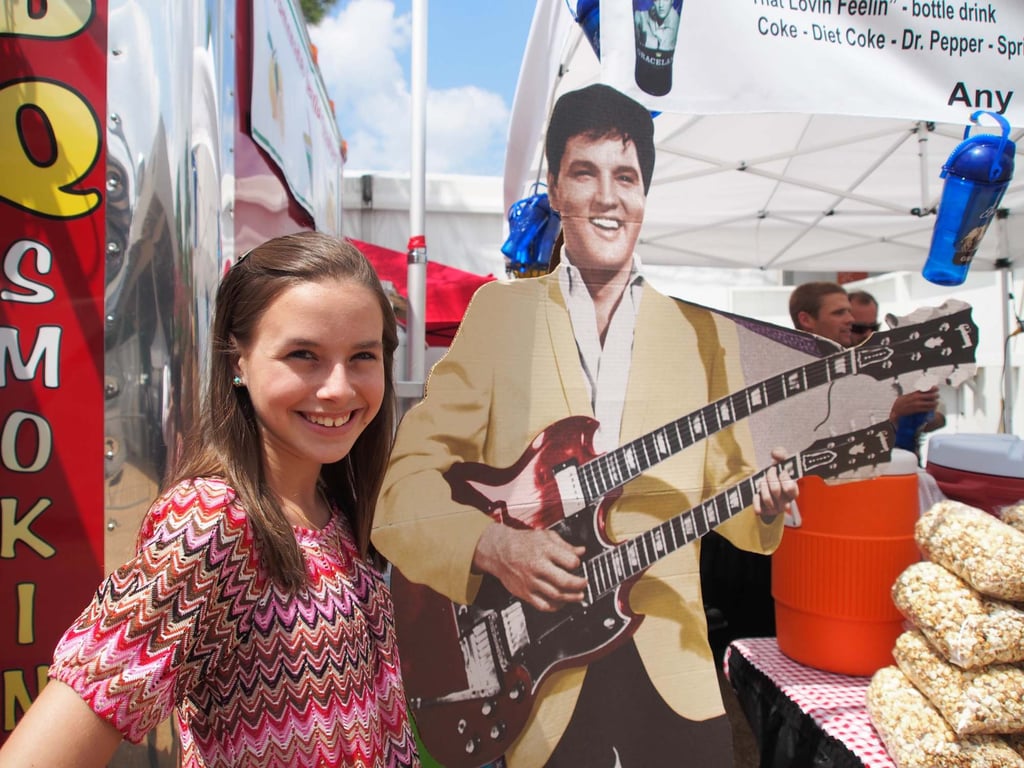 Elvis Aaron Presley-TCB 4EVR Official Fan Club president Isabella T. Scott poses in front of a cut-out of Elvis Presley in 2012. Photo: AFP Elvis Aaron Presley-TCB 4EVR Official Fan Club president Isabella T. Scott poses in front of a cut-out of Elvis Presley in 2012. Photo: AFP