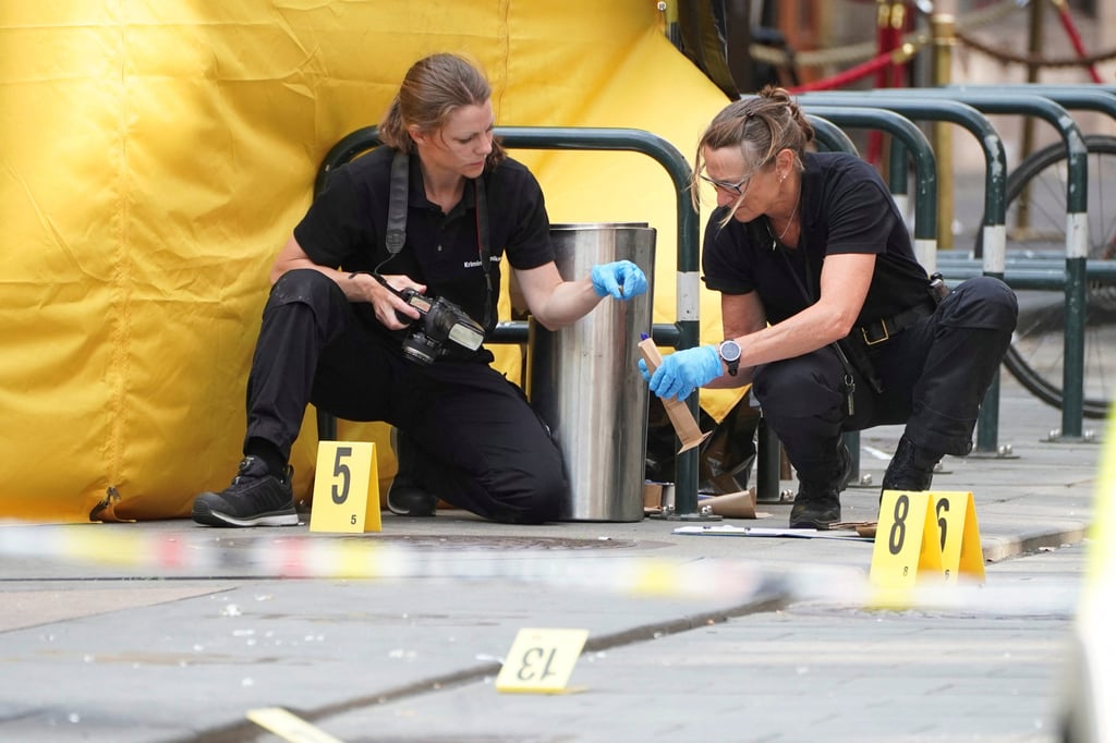 Forensic technicians following a fatal shooting in Oslo, Norway. Photo: Reuters