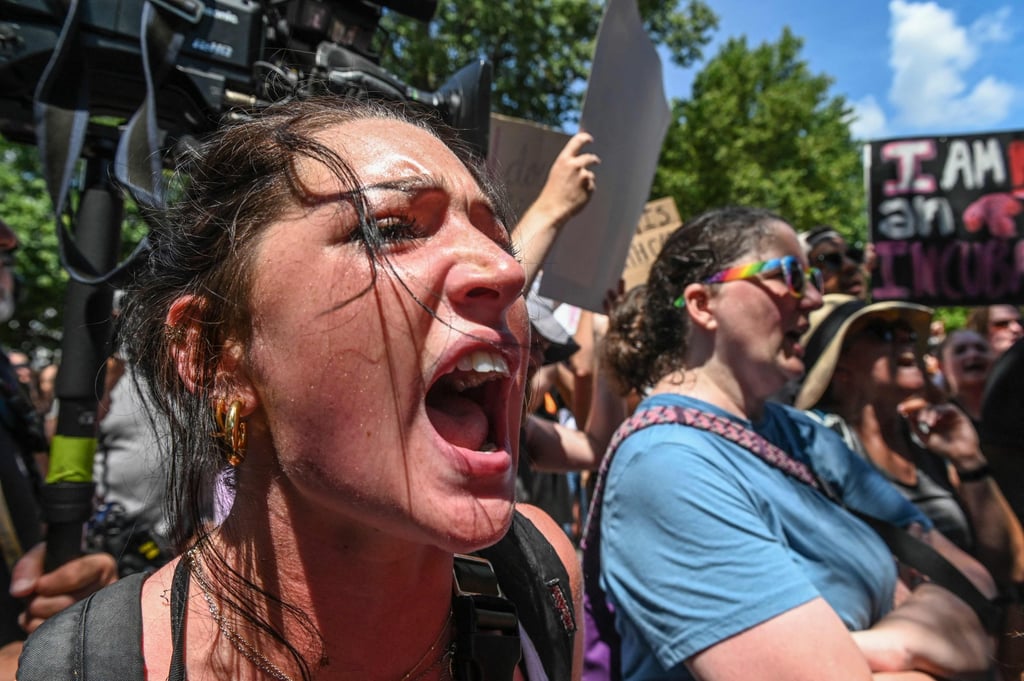An abortion rights protester shouts in front of the US Supreme Court in Washington on Sunday. Photo: AFP