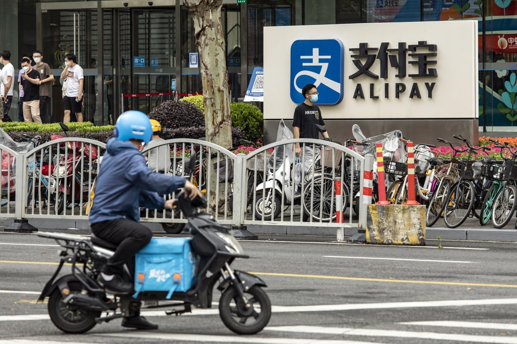 A sign of mobile payment service Alipay outside an Ant Group office building in Shanghai. Photo: Bloomberg