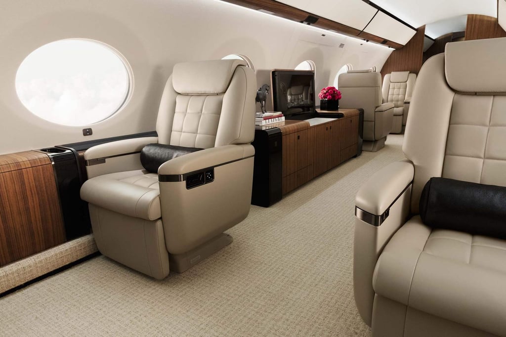 The seats on Kim Kardashian’s private jet are padded with foot rests. Photo: Gulfstream