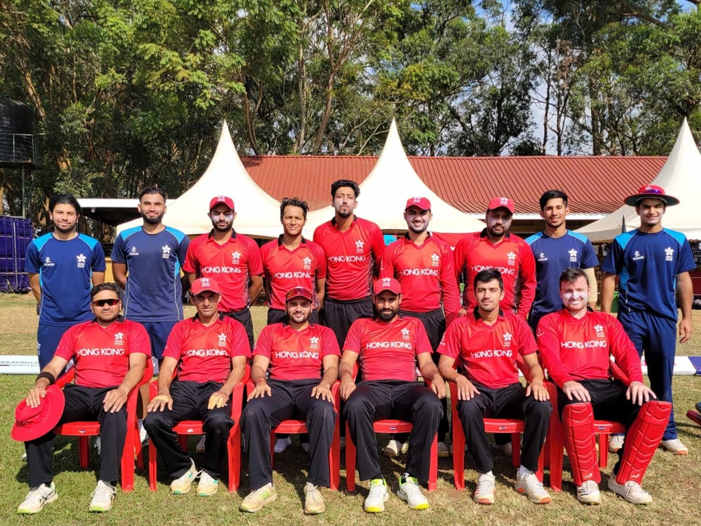 The Hong Kong cricket team pose for a picture before their side’s final Challenge League B game in Uganda against Kenya. Photo: Cricket Hong Kong The Hong Kong cricket team pose for a picture before their side’s final Challenge League B game in Uganda against Kenya. Photo: Cricket Hong Kong