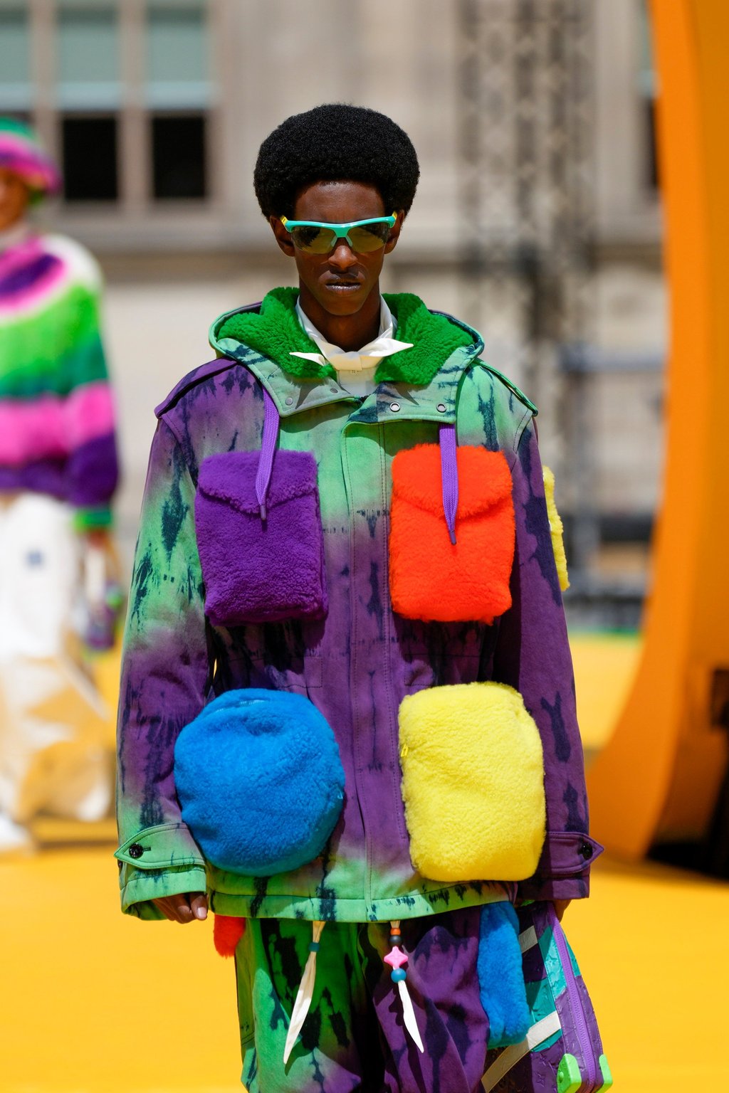 A model showing off a carnival of colour as part of the Louis Vuitton men’s spring/summer 2023 collection presented in Paris, France, on June 23. Photo: AP Photo A model showing off a carnival of colour as part of the Louis Vuitton men’s spring/summer 2023 collection presented in Paris, France, on June 23. Photo: AP Photo