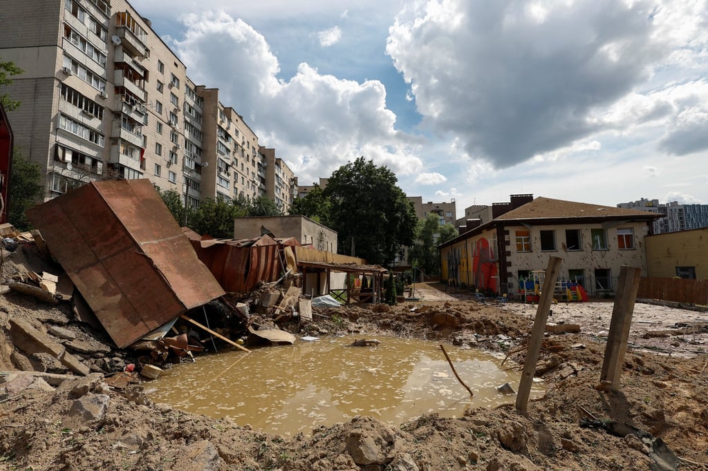 A crater is seen at a compound of a kindergarten after a Russian missile strike in Kyiv, Ukraine on Sunday. Photo: Reuters A crater is seen at a compound of a kindergarten after a Russian missile strike in Kyiv, Ukraine on Sunday. Photo: Reuters