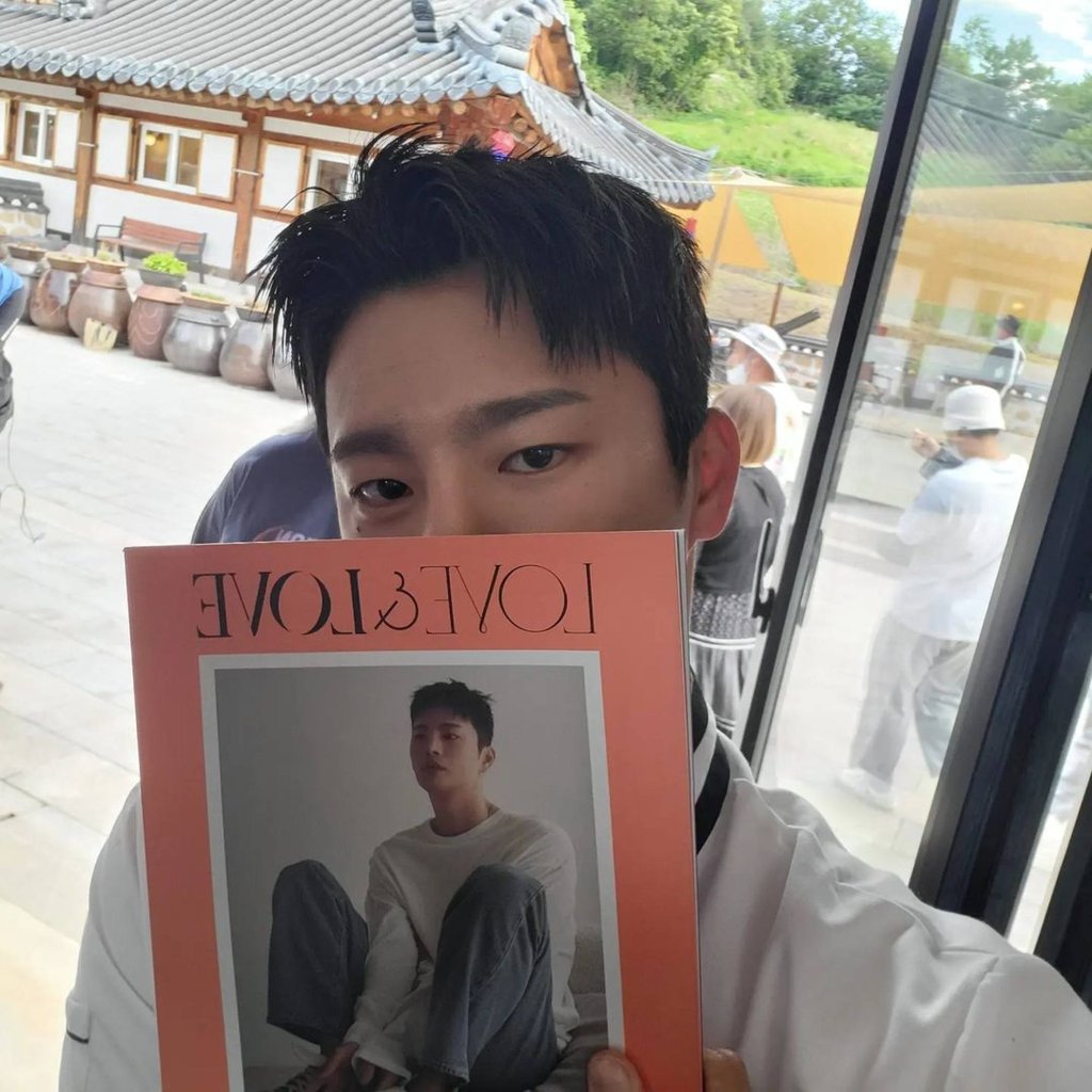 Seo In-guk holding his album, Love & Love. Photo: @seo_cccc/Instagram
