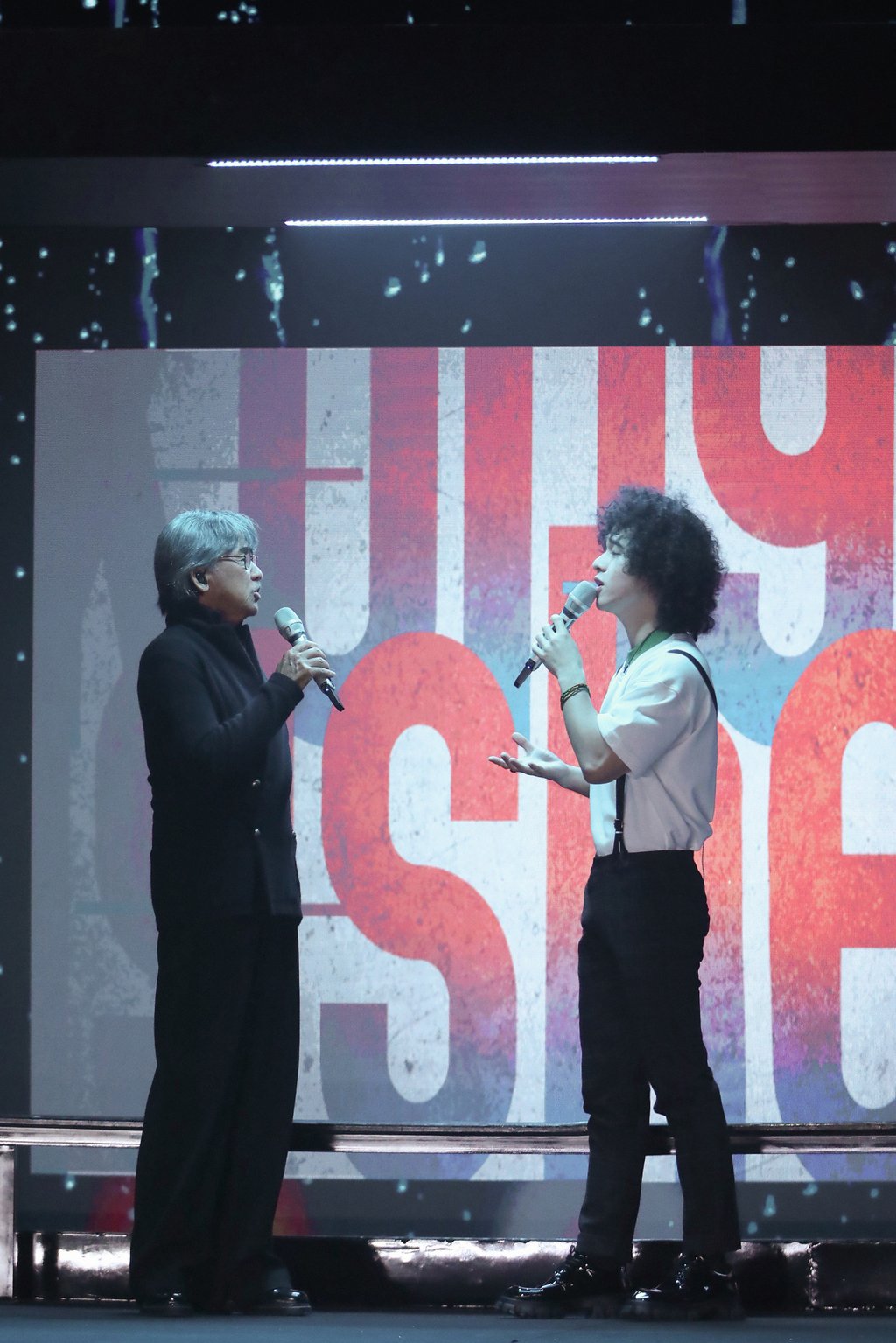 Tsang performs with veteran Hong Kong singer George Lam on Infinity and Beyond. Tsang performs with veteran Hong Kong singer George Lam on Infinity and Beyond.