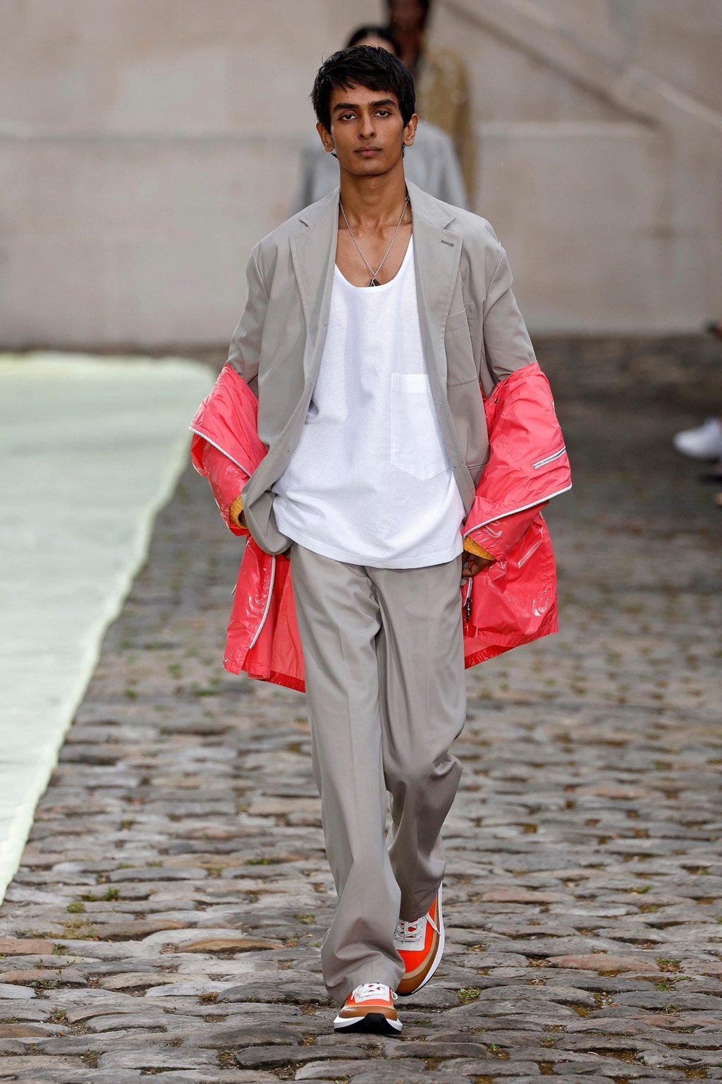 A grey and salmon pink look from Hermès’ spring/summer 2023 collection, presented during the men’s fashion week in Paris, France, on June 25. Photo: Xinhua A grey and salmon pink look from Hermès’ spring/summer 2023 collection, presented during the men’s fashion week in Paris, France, on June 25. Photo: Xinhua