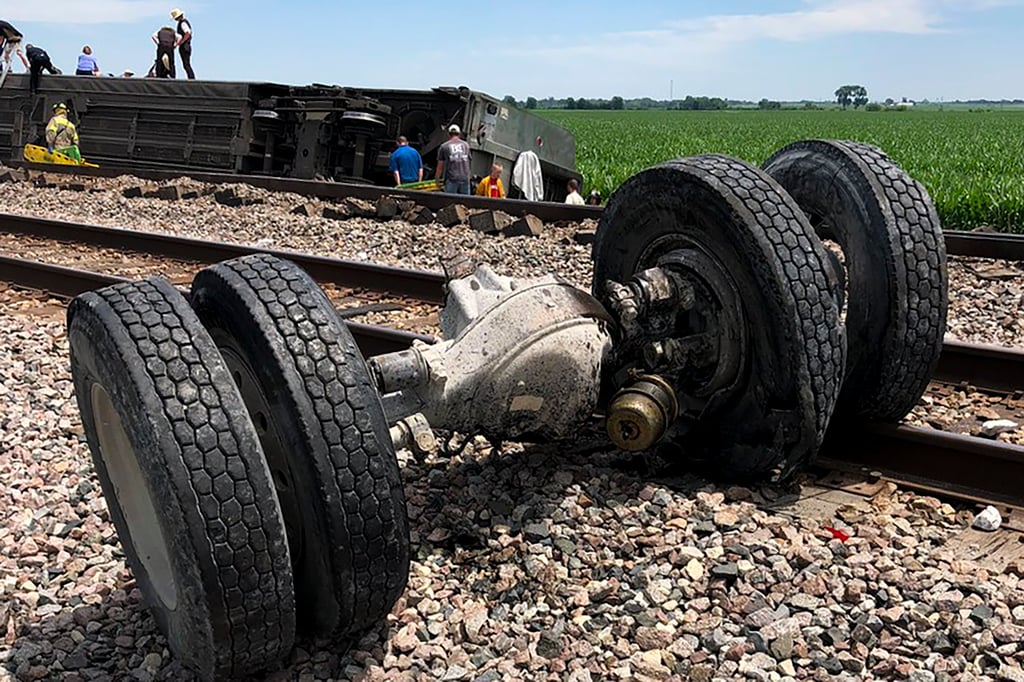 Debris sits near railroad tracks after an Amtrak passenger train derailed near Mendon, Missouri, on Monday. Photo: Dax McDonald via AP