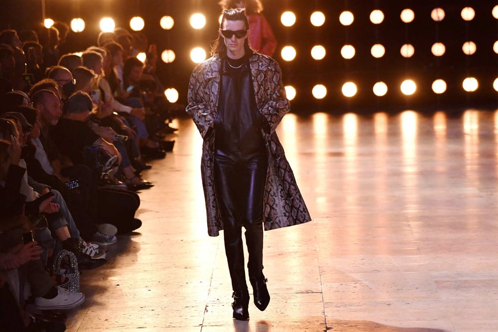 A sweeping animal-print coat tops a black outfit at Celine’s menswear ready-to-wear spring/summer 2023 Fashion Week in Paris on June 26, 2022. Photo: AFP A sweeping animal-print coat tops a black outfit at Celine’s menswear ready-to-wear spring/summer 2023 Fashion Week in Paris on June 26, 2022. Photo: AFP