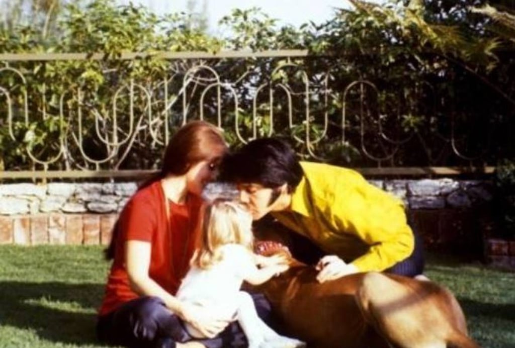 Happier times: Elvis, Priscilla and Lisa Marie Presley relaxing at Graceland. Photo: @ElvisRocks4Ever/Twitter Happier times: Elvis, Priscilla and Lisa Marie Presley relaxing at Graceland. Photo: @ElvisRocks4Ever/Twitter