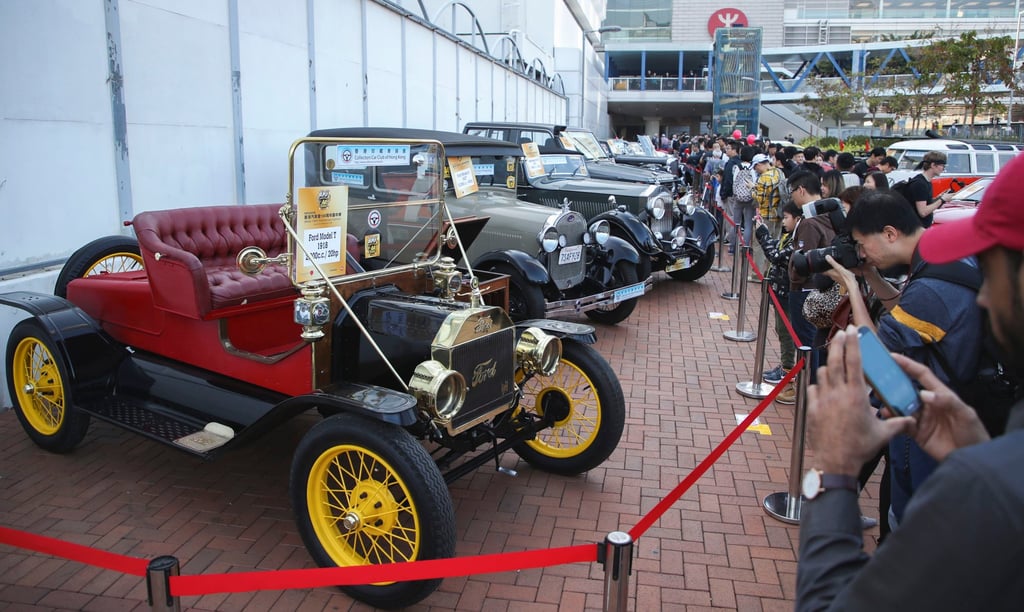 Visitors ogle classic rides during the Automobile Association 100th anniversary carnival held at Edinburgh Place in Central in 2018. Photo: Edward Wong Visitors ogle classic rides during the Automobile Association 100th anniversary carnival held at Edinburgh Place in Central in 2018. Photo: Edward Wong