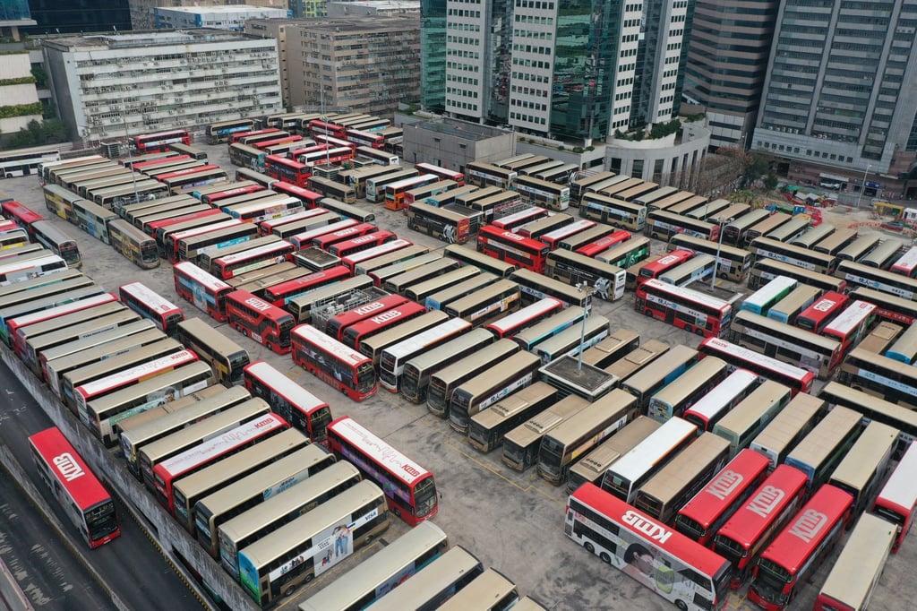 Buses parked at a KMB depot in Kowloon Bay on March 2, 2022. The company says it aims to retire all its diesel-powered buses by 2040. Photo: SCMP / Sam Tsang