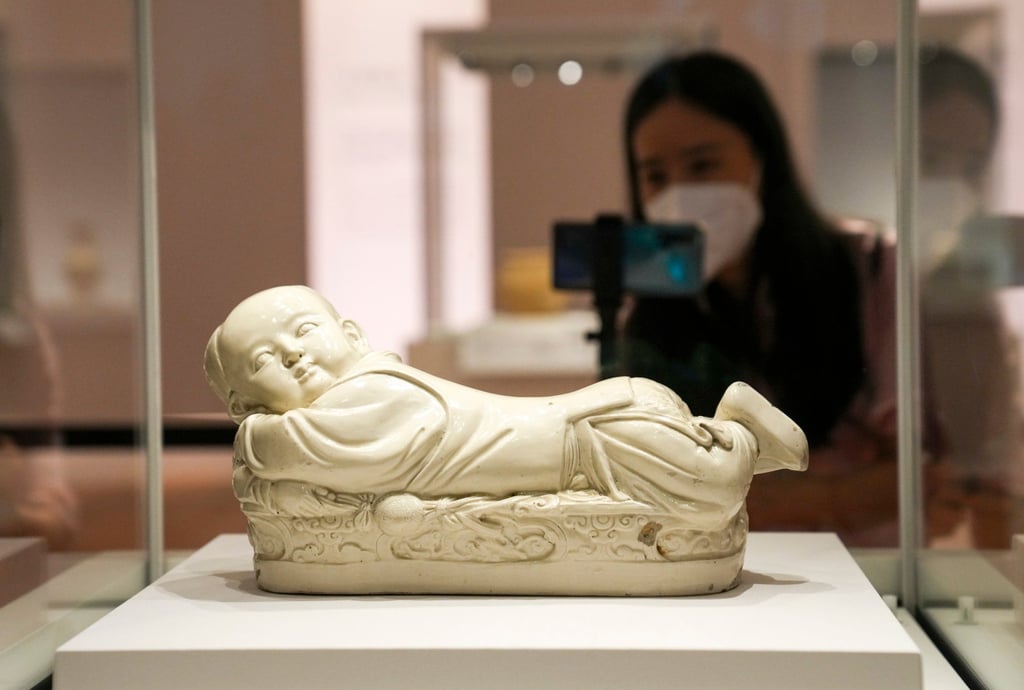 A headrest in the shape of a reclining boy at Hong Kong Palace Museum. Photo: Sam Tsang