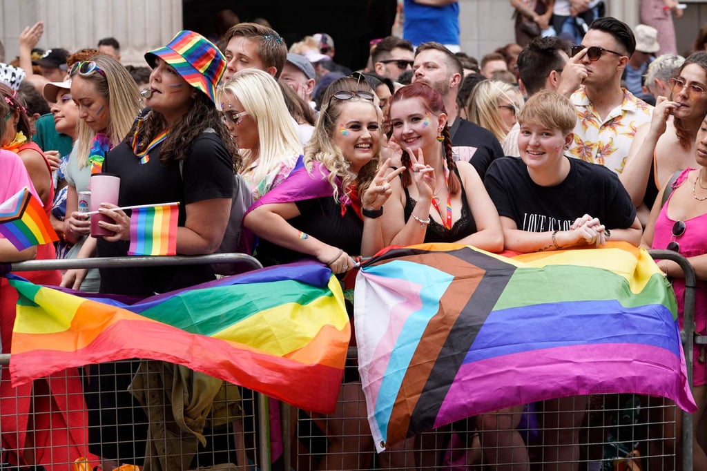 Spectators line the route as members of the LGBT community take part in the annual Pride parade in the streets of Soho, London, UK on Saturday. Photo: AFP