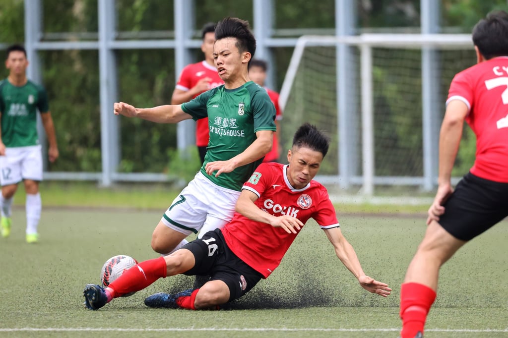 Sham Shui Po (in green) and Golik North District contest the earlier semi-final, with Sham Shui Po winning 2-1. Photo: Dickson Lee