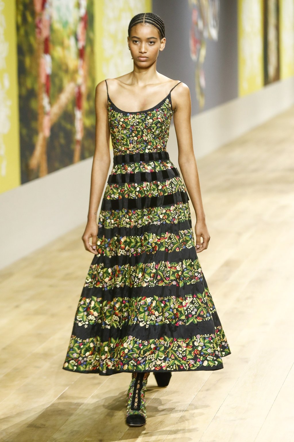 Images of traditional embroidery and floral paintings by Ukrainian artist Olesia Trofymenko not only adorned the runway, but also inspired the autumn/winter 2022-23 haute couture collection for fashion house Dior by designer Maria Grazia Chiuri during Paris Fashion Week, in Paris, France, July 2022. Photo: EPA-EFE