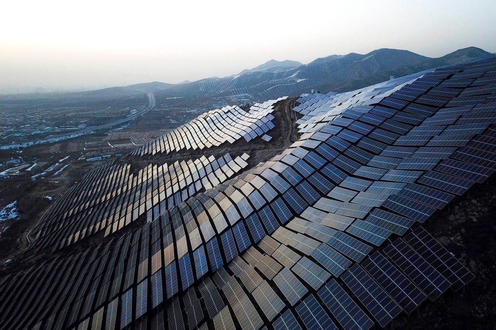 Solar panels cover hillsides in Zhangjiakou, in China’s northern Hebei province, on November 15, 2021. The country aims to get 25 of its power from renewable sources by 2030. Photo: AFP Solar panels cover hillsides in Zhangjiakou, in China’s northern Hebei province, on November 15, 2021. The country aims to get 25 of its power from renewable sources by 2030. Photo: AFP
