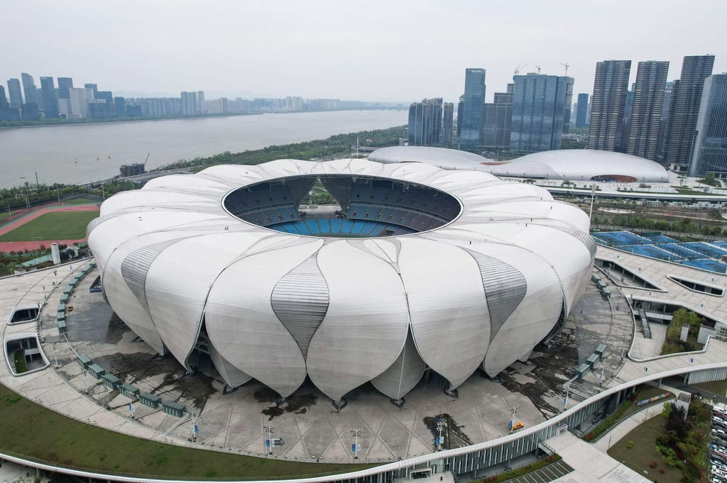 The Alibaba Station was part of the Airport Express line, set to open ahead of the 19th Asian Games, which will host major events at the Hangzhou Olympic Sports Centre Stadium, pictured above. Photo: AFP The Alibaba Station was part of the Airport Express line, set to open ahead of the 19th Asian Games, which will host major events at the Hangzhou Olympic Sports Centre Stadium, pictured above. Photo: AFP