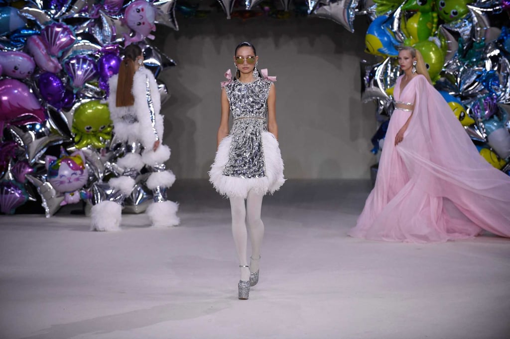 A shimmering, space age silver dress with ostrich feathers at Giambattista Valli’s women’s haute couture autumn/winter 2022-2023 collection during a fashion show as part of the Fashion Week in Paris, on July 4. Photo: AFP