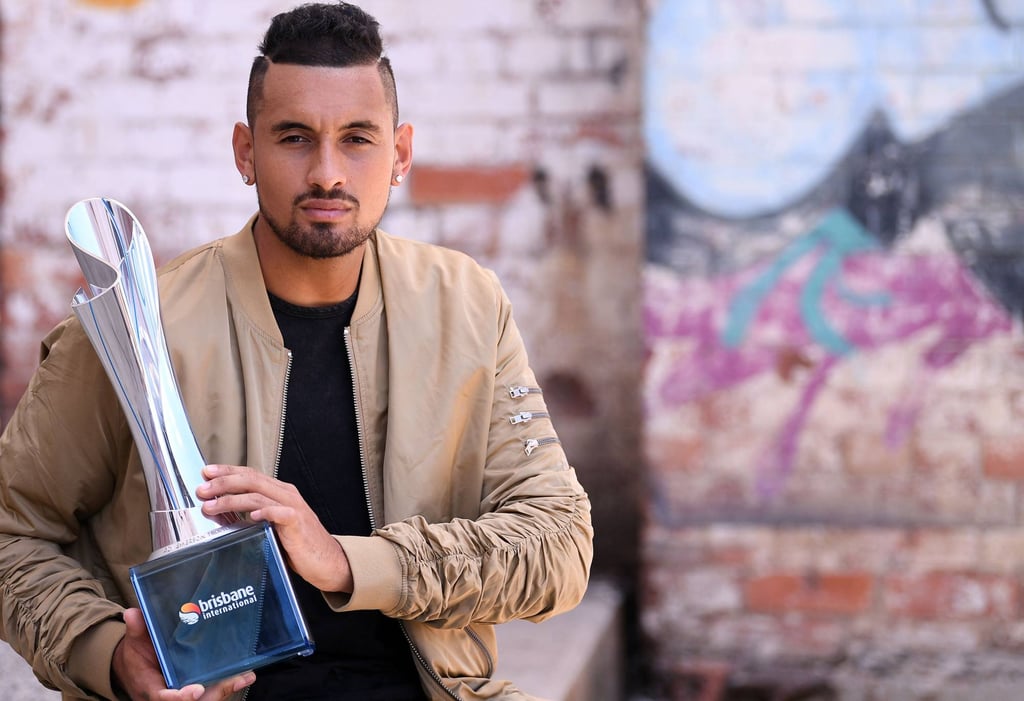Nick Kyrgios is a highly talented player, pictured here with his trophy for winning the men’s singles at the 2018 Brisbane International Tennis Tournament. Photo: AFP