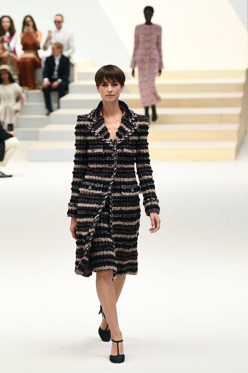A striped coat over a dress with the same pattern, presented by Chanel for its women’s haute couture autumn/winter 2023 Fashion Week in Paris, on July 5. Photo: AFP