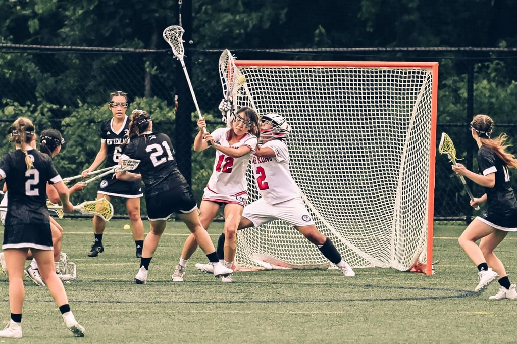 Hong Kong goalie Liu Hui-tan saves a shot against New Zealand at the World Lacrosse Women’s Championship. Photo: Handout
