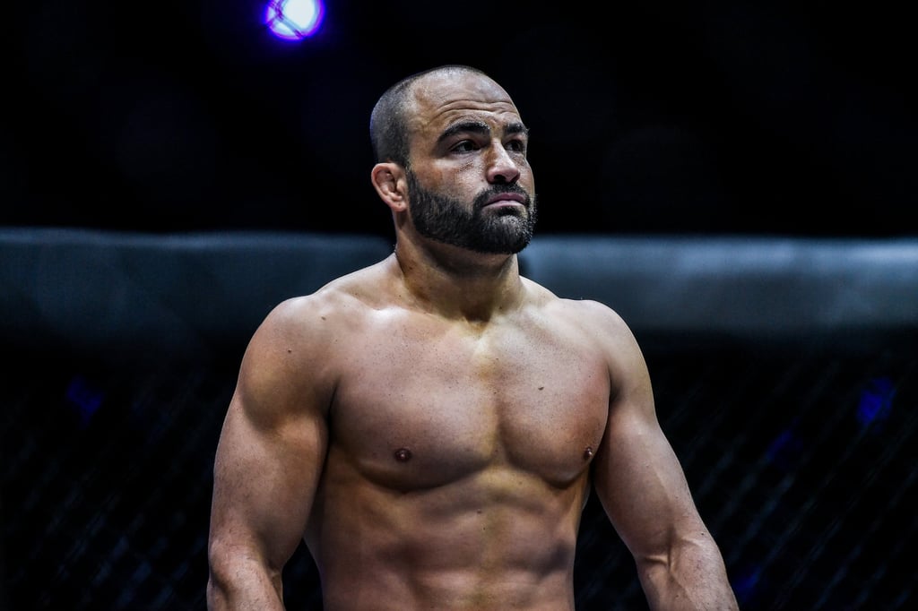 Eddie Alvarez looks on dejectedly after an illegal shot. Eddie Alvarez looks on dejectedly after an illegal shot.