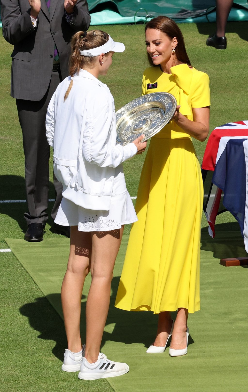 Elena Rybakina of Kazakhstan receives the trophy from Catherine, Duchess of Cambridge, after winning the women’s final match against Ons Jabeur of Tunisia at Wimbledon, Britain on Saturday. Photo: EPA-EFE